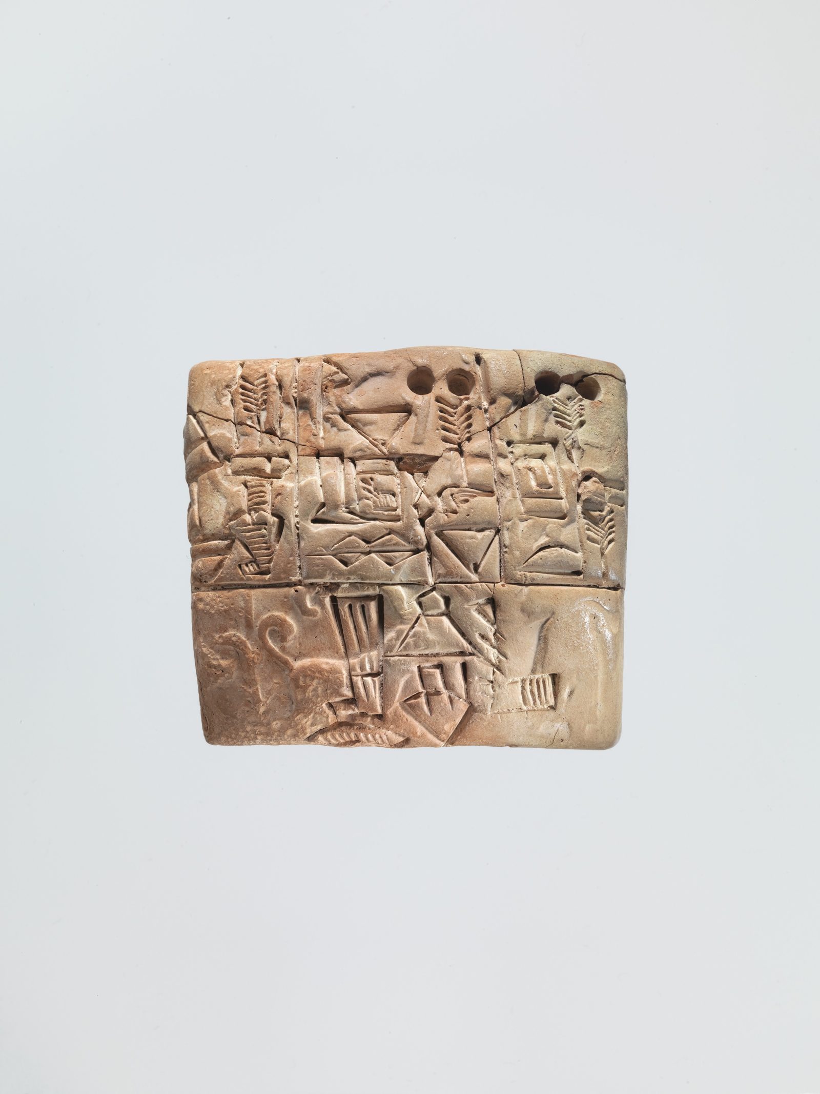 Proto-cuneiform clay tablet recording an administrative account of barley distribution